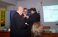 ...a drugi otrzymał Współorganizator konferencji, Prezes Polskiego Stowarzyszenia Pedagogów i Animatorów KLANZA - Zdzisław Hofman (na dole głowa prof. Żurka).